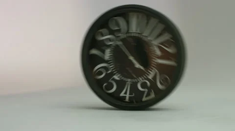 Antique clock slowly rolling on the floor.  Видео 59719709