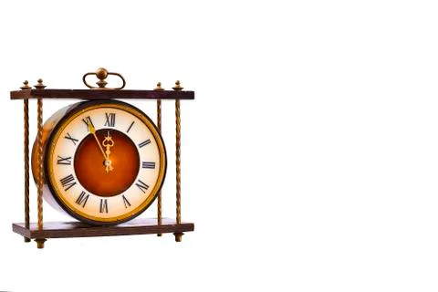 Antique clock on a white background. Five to twelve. Stock Photos