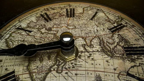 Antique clock with world map running time lapse 4k  Stock Footage 130638521