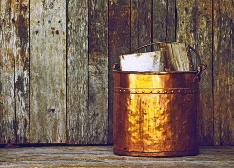 Antique coal scuttle. Stock Photos