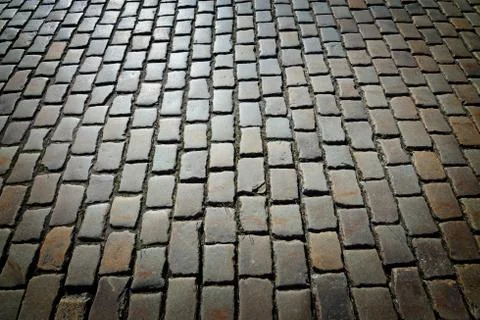 Antique cobblestone pavement Stock Photos