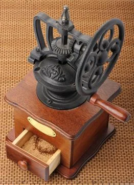 Antique coffee mill Stock Photos