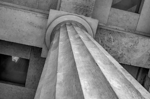 Antique column of a building close-up. Stock Photos