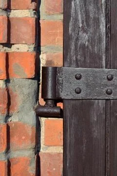Antique door hinge closeup Stock Photos