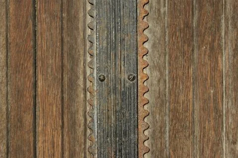 Antique doors with metal elements. Stock Photos