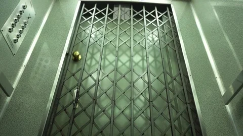 Antique elevator gracefully descending Stock Footage 255599508
