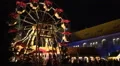 Antique ferris wheel at Christmas fair with medieval location HD Footage