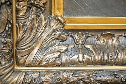 Antique gilded frame corner with decorative relief Stock Photos