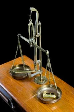Antique gold scale Stock Photos
