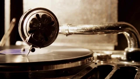 Antique gramophone needle playing record in a dark room Stock Footage 329559830