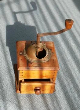 Antique hand mill Stock Photos