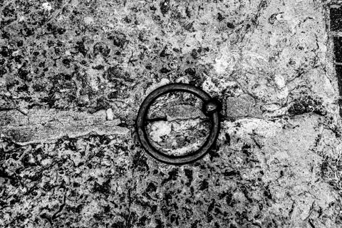 Antique iron ring fixed to the dock Stock Photos