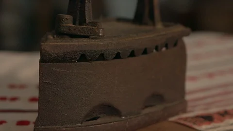 Antique Iron on the table Vídeo Stock 94724234