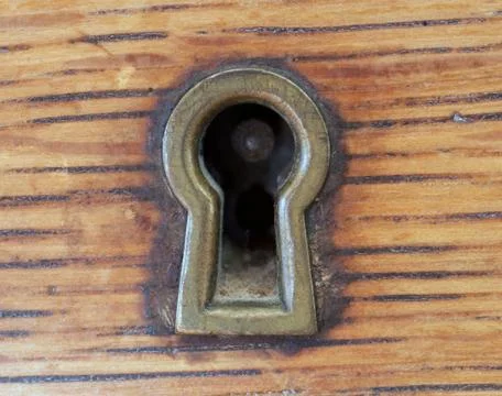 Antique key hole Stock Photos