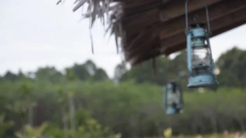 Antique lanterns hanging in the resort Stock Footage 158521298