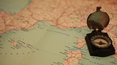 Antique magnetic compass, binoculars, on old map, traveling, measurements Stock Footage 35794246