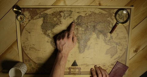 Antique Map With Man Pointing At Ireland Magnifying Glass And UK Passport  Stock Footage 114011408