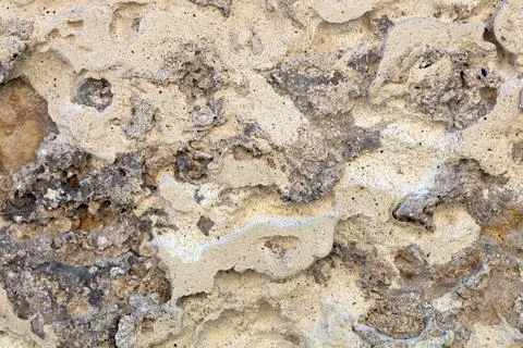 Antique masonry surface in sandy tones Foto stock