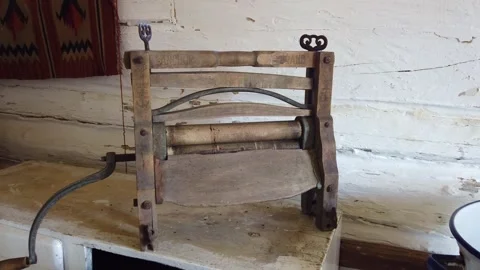 Antique Mechanical Laundry Wringer Operating Indoors in Museum Setting Stock Footage 342124059