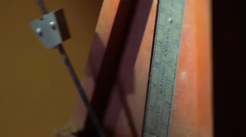 Antique Metronome close up 02 Stockbeeldmateriaal 11079375