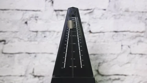Antique metronome with pendulum in slow motion. Vintage wooden classic style Stock Footage 146742953