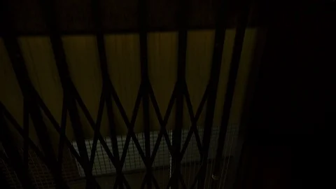 Antique old elevator moving down to ground floor in building. Transport in Video stock 120652129