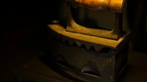 Antique old Iron in the attic - camera moving close on dolly 스톡 동영상 112718665