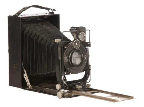 Antique old photo camera isolated on white Stock Photos