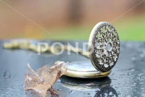 An antique pocket watch Stock Photos
