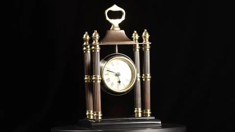 Antique Replica Desk Clock with Columns Bombay Co. 03 Video stock 295663954