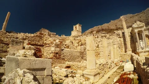 Antique Ruins Columns Heroon on Background Mountains Blue Sky Stock Footage 75325489