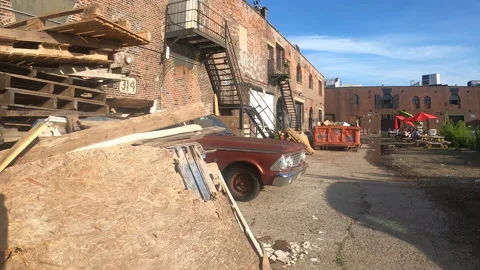 Antique Run-Down abandoned Car parked in Industrial Area - New York City Stock Footage 156526676