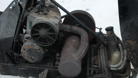 Antique Rusted Old Snowmobile Engine close up panning shot, 4k Stock Footage 126725526