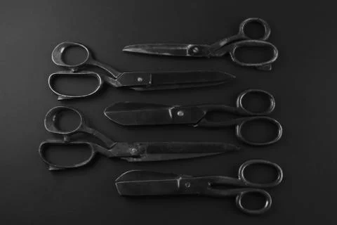 Antique rusty scissors isolated on black Stock Photos