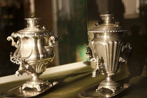 Antique samovar on a table, shallow depth of field Stock Photos