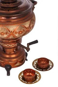 The antique samovar on the white background Stock Photos