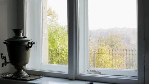 Antique Samovar on the Windowsill, behind the Window Valley Landscape Video stock 267482288