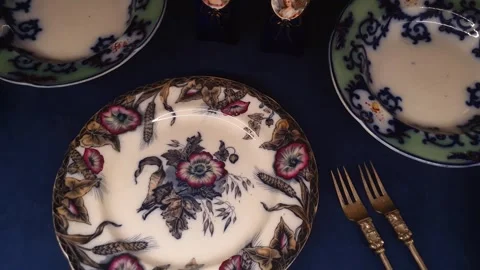 Antique saucers and plates with patterns. A set of antique tableware. Stock-Footage 342518235