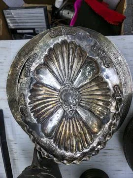 Antique silver plated serving tray features embossed floral patterns and ba.. Stock Photos