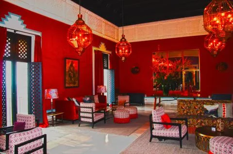 Antique sofas and chairs in the hall, red interior Stock Photos