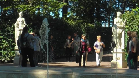 Antique statues on the paths of the Summer Garden on a sunny summer day. Stock Footage 340529760