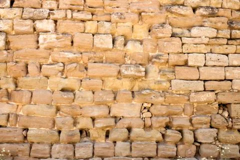 Antique stone wall background Stock Photos