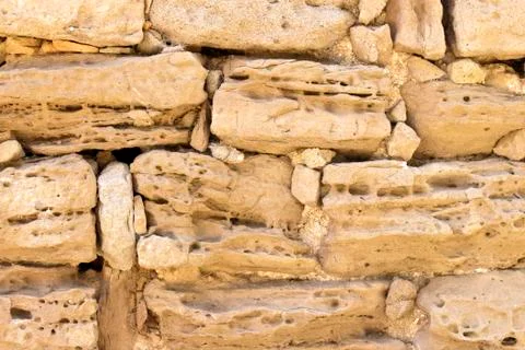 Antique stone wall background Stock Photos
