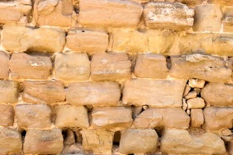 Antique stone wall background Stock Photos