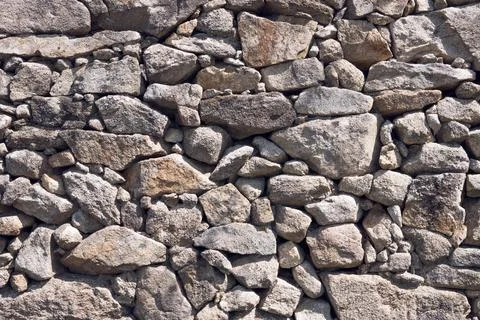Antique Stone wall Background texture Stock Photos