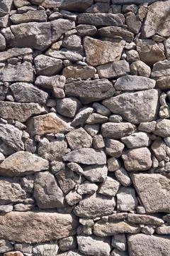Antique Stone wall Background texture Stock Photos