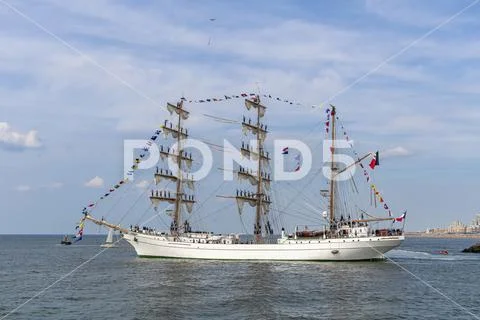 Antique tall ship, vessel leaving the harbor of The Hague, Scheveningen under Stock Photos