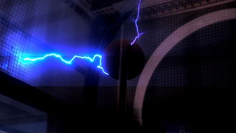 Antique tesla coil in dark discharging electric lightning bolts Stock Footage 114155190
