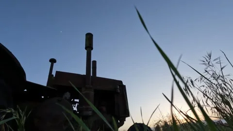Antique Tractor Sunset Stock Footage 249917313