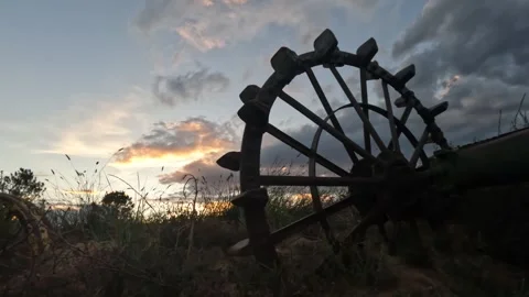 Antique Tractor Wheel Sunset Video stock 249856520